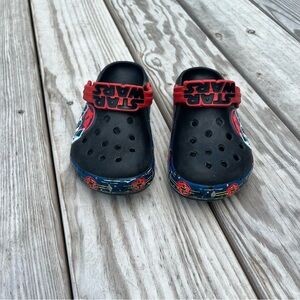 Crocs Star Wars Black and Red Slippers with Perforated Design